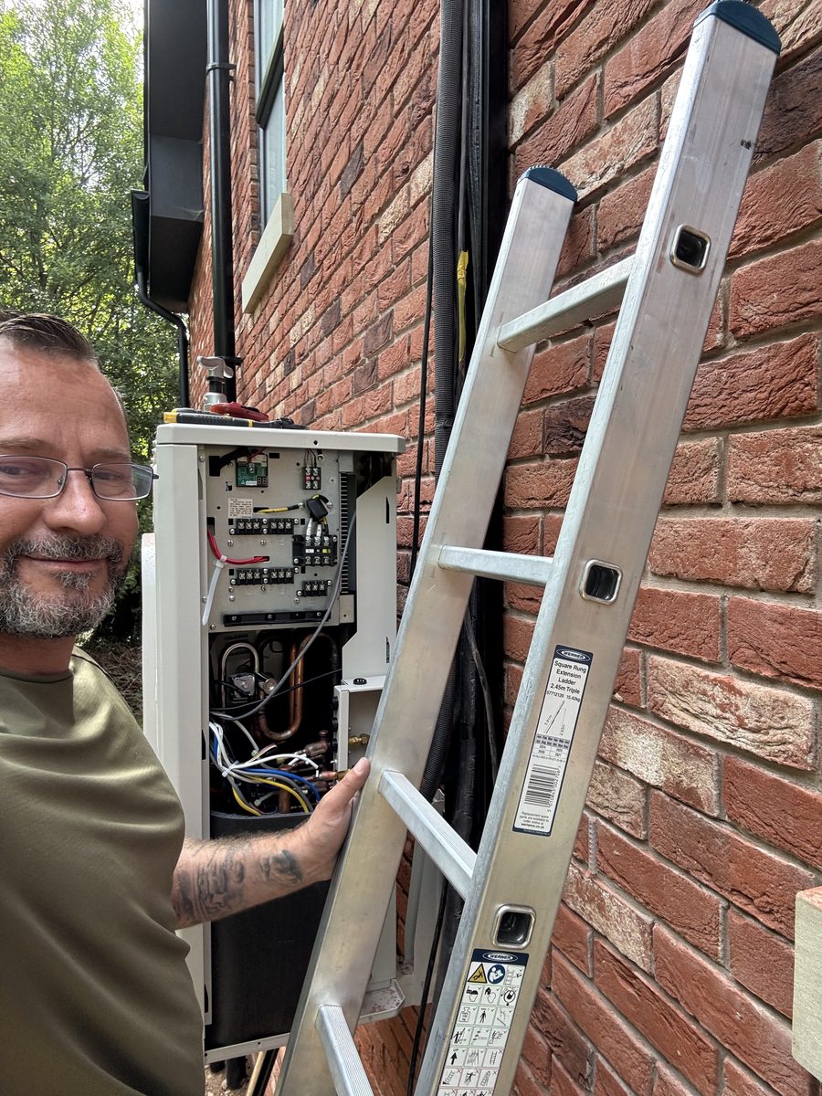 Matthew on site, working on an air conditioning unit