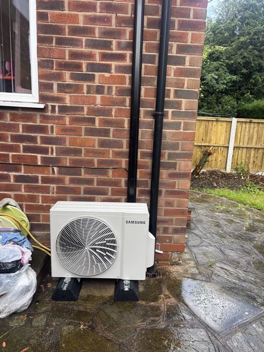 Samsung outdoor condenser unit on a patio